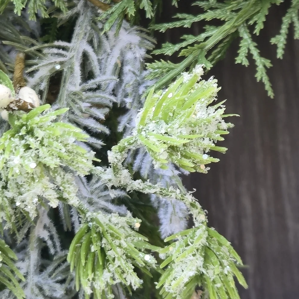 Handmade lush, artificial Winter Greenery Wreath With White And Brown Accents